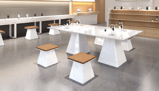 Professional office furniture installation team assembling desks in a corporate building