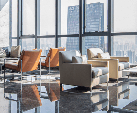 A sleek modern china conference table in a minimalist executive boardroom