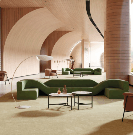 Architect reviewing 3D furniture models and CAD files for a commercial layout