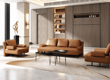 Modern office with several electric lift desks in a bright workspace