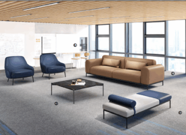 Professional installation team assembling office furniture in a corporate setting