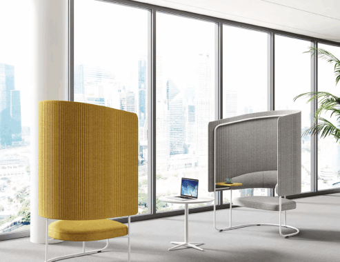 Modern open plan office with custom workstations and ergonomic chairs