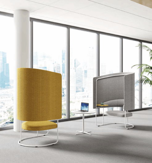 Modern open plan office with ergonomic desks and chairs from a turnkey manufacturer