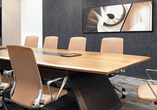 Modular office desks in a modern factory setting