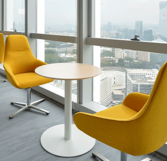Modern office workstation partitions in a bright 2026 corporate office