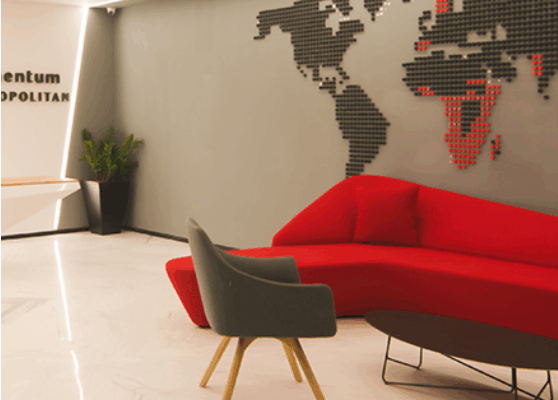 Modern height adjustable executive desk in a luxury office setting
