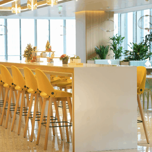 Professional buyers discussing furniture specifications with manufacturers