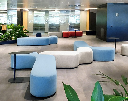 Modern office desk arrangement in a European showroom