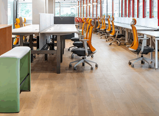 Close up of low VOC office furniture with natural wood finish