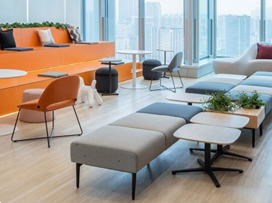 Ergonomic outdoor task chairs arranged in a collaborative garden workspace